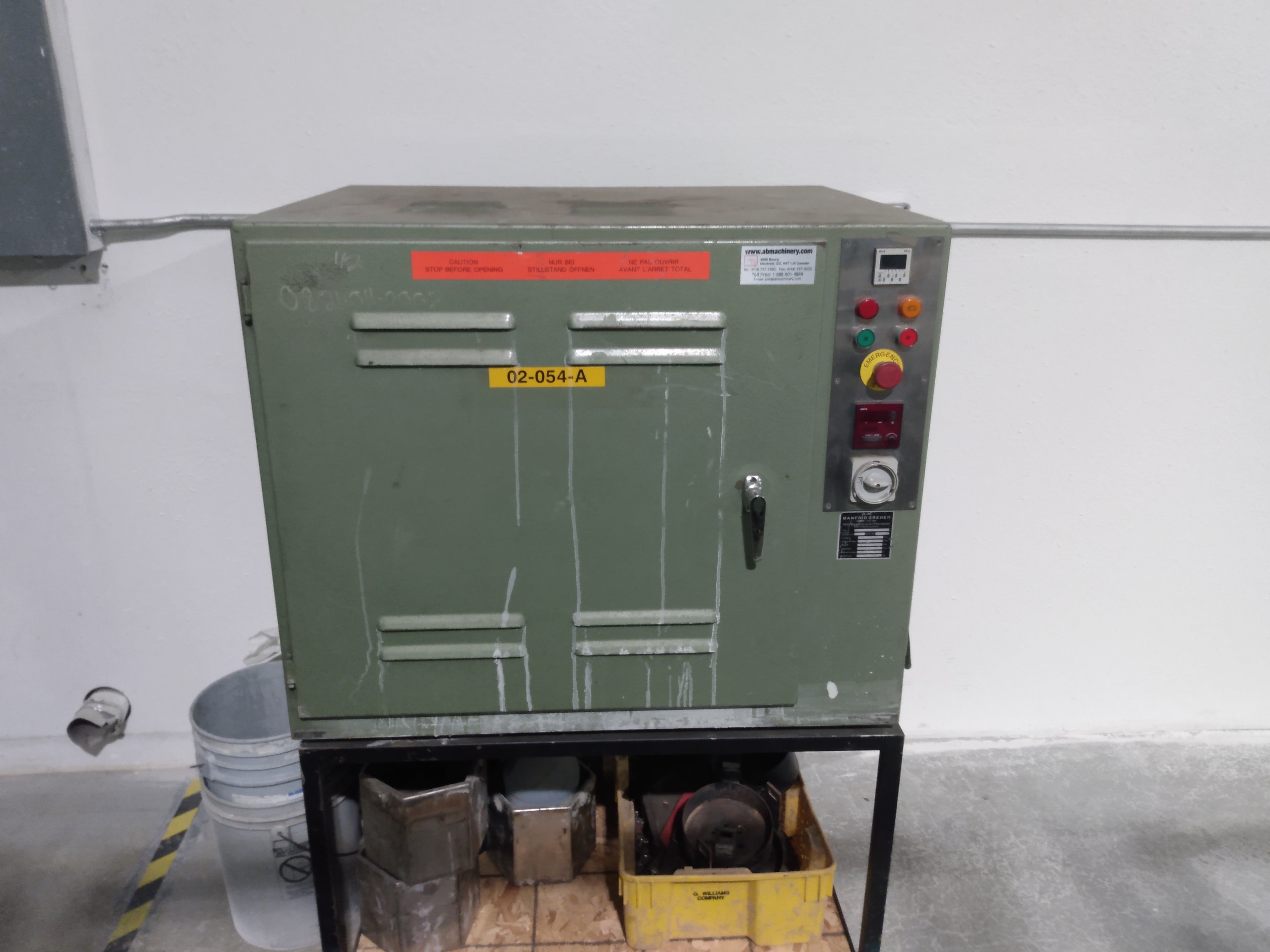 Centrifugal barrel tumbler machine.