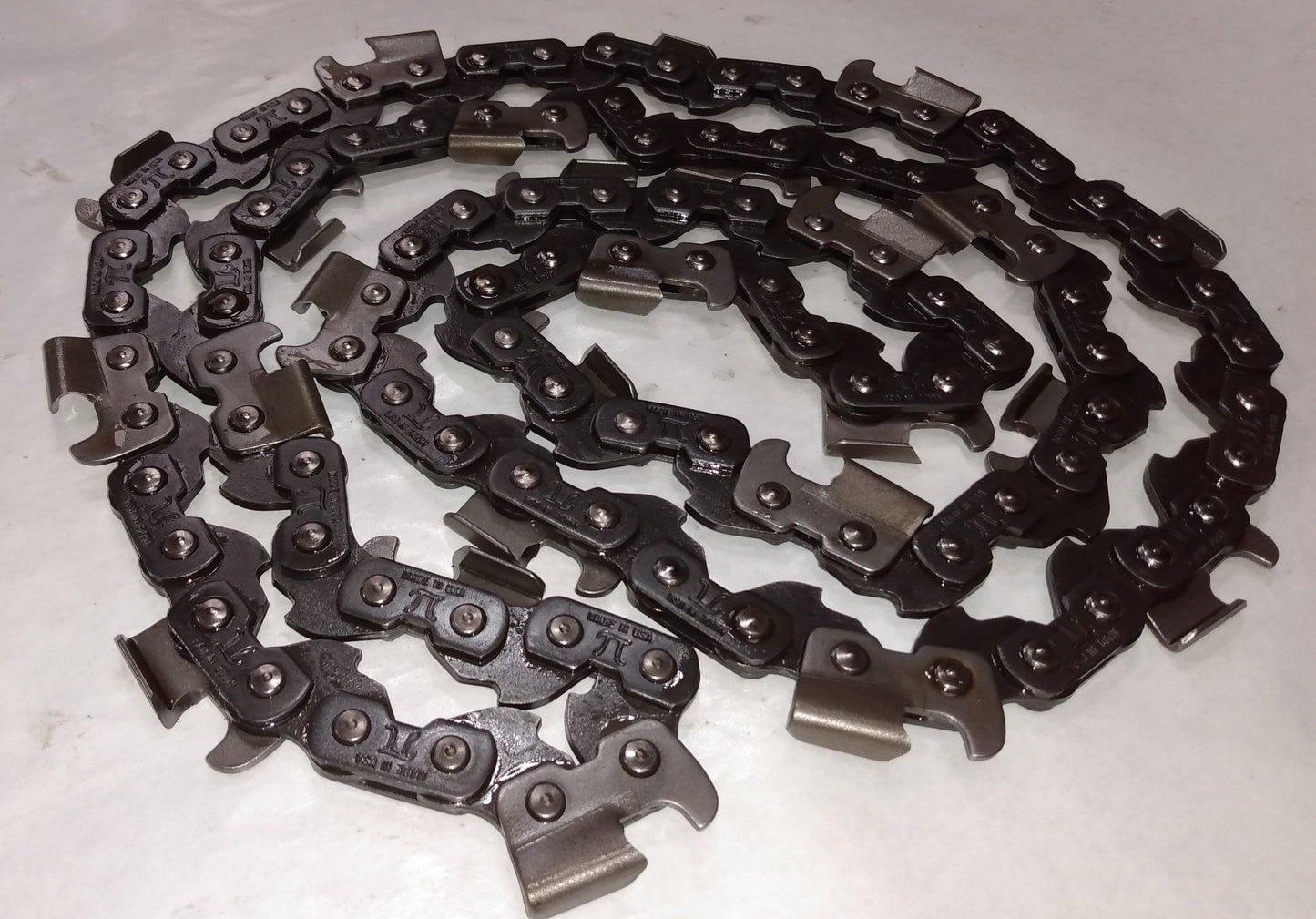 Pi Harvester Chain loop laying on flat surface.