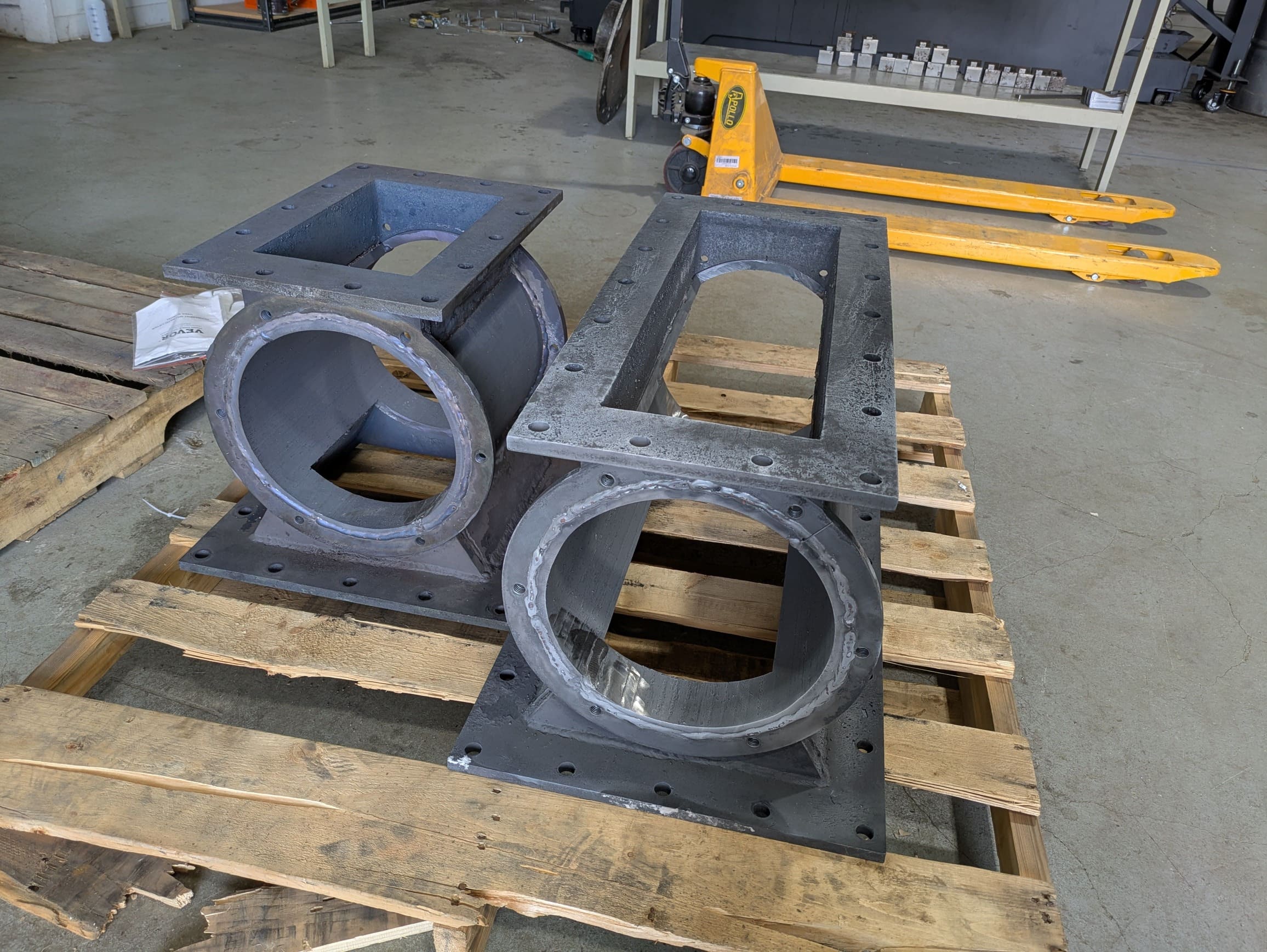 Airlocks, recently rebuilt and annealed, awaiting their final machining process of boring.