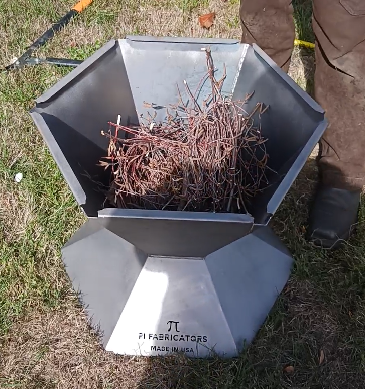 Biochar fire pit filled with tinder and ready to be lit. 