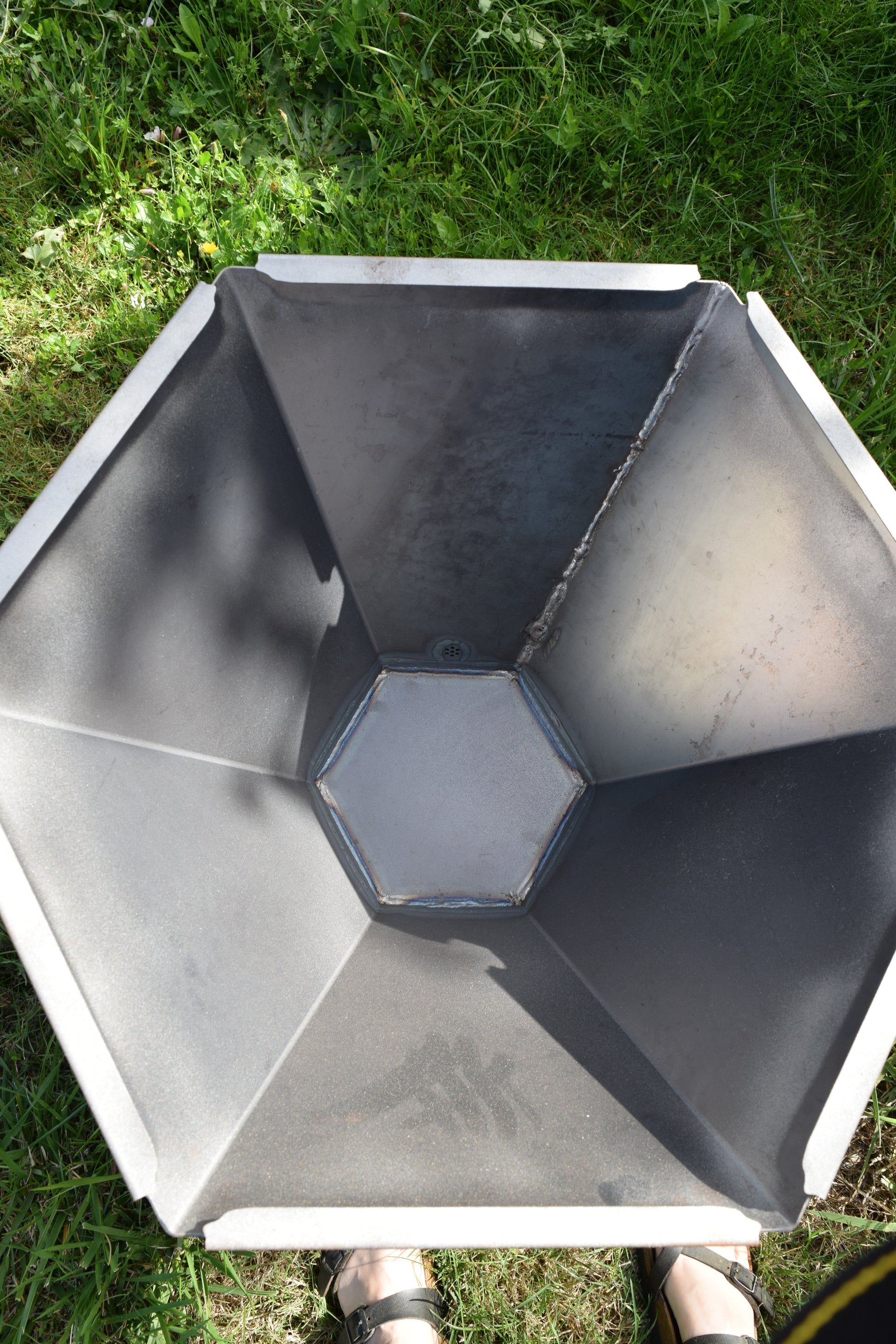 Top view of the biochar fire pit showing the inside of the biochar fire pit. 