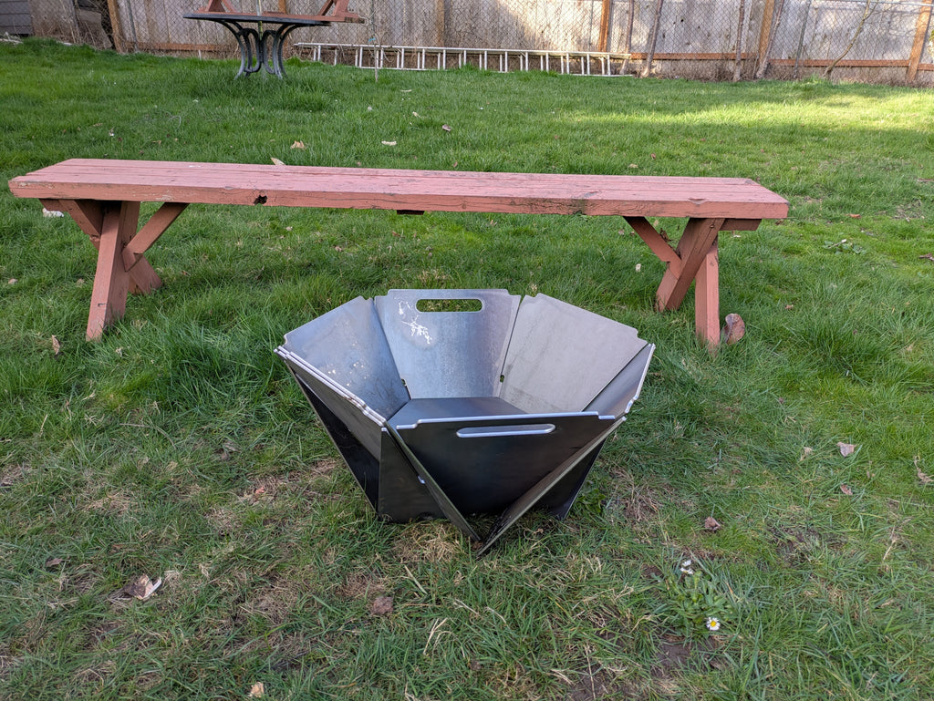 Collapsible fire pit