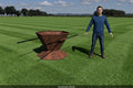 Rendering of the Large Biochar-Making Fire Pit, a 48 inch hexagonal flame-cap biochar kiln in 11 gauge steel with two removable pipe handles, beside a person for scale. A rendered image: the first one has not been built yet.