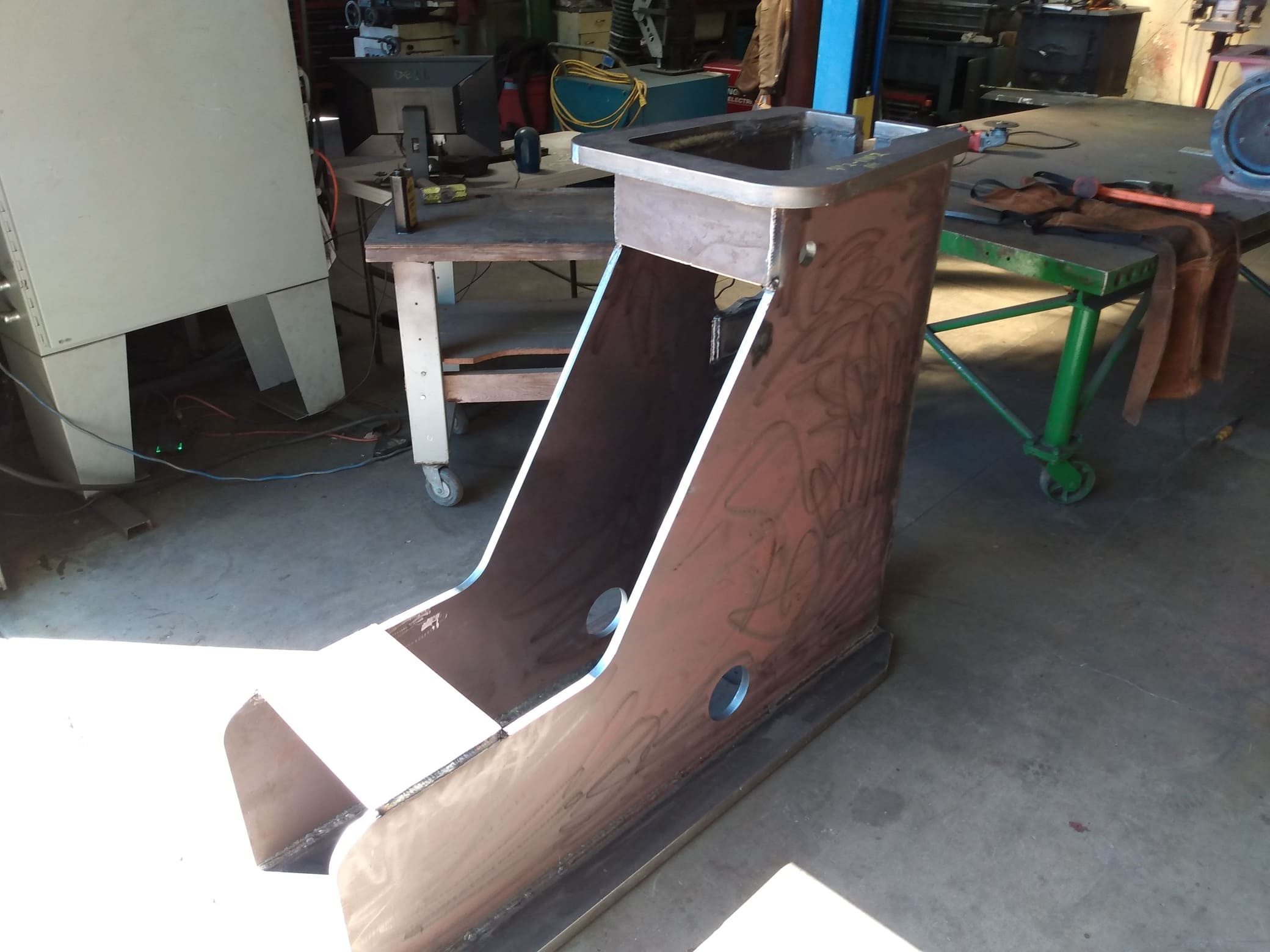 Large carriage knee fabricated by Pi Fabricators for a sawmill, demonstrating Pi Fabricators' ability to manufacture large weldments.